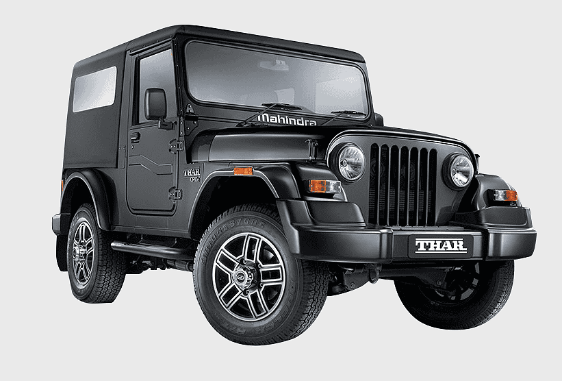 Mahindra Thar CRDe, four-wheel drive SUV, off-road vehicle, automotive exterior, rugged terrain vehicle, adventure-ready jeep, premium off-roading experience